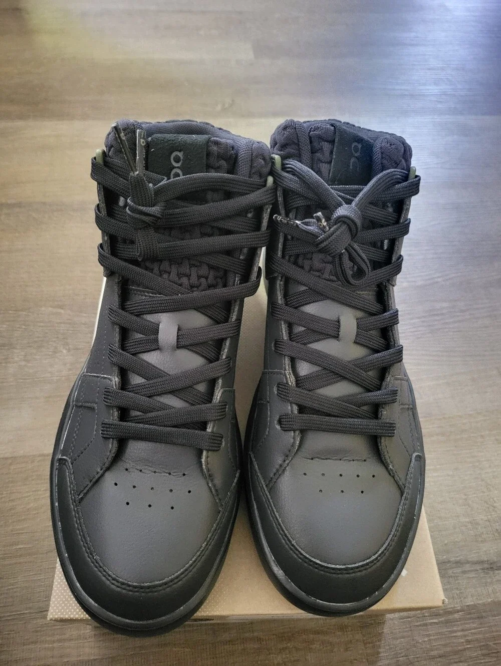 On Running Black High-Top Athletic Shoes with Olive Accents